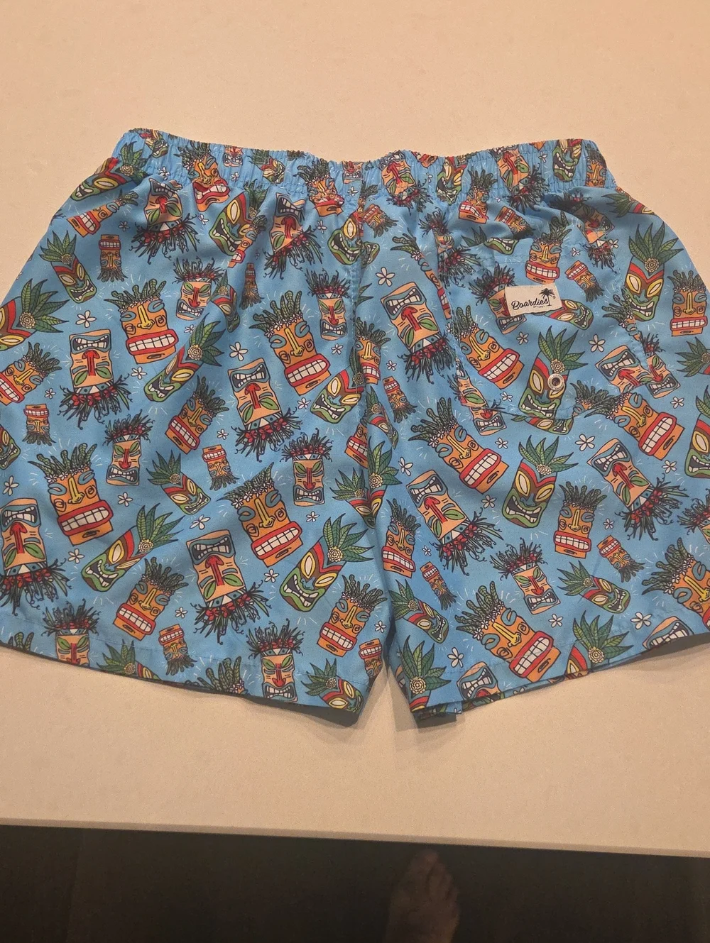 Kids' Light Blue Tiki Print Swim Trunks